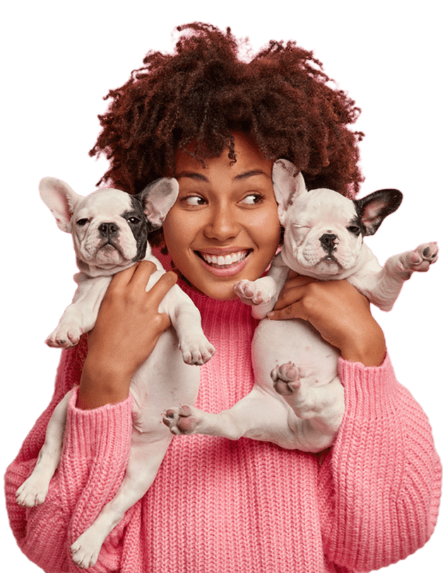 happy dog mom holding puppies
